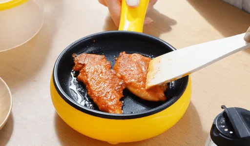 Image for article This Portable Frying Pan Could Make Your DIY Trips Even Easier