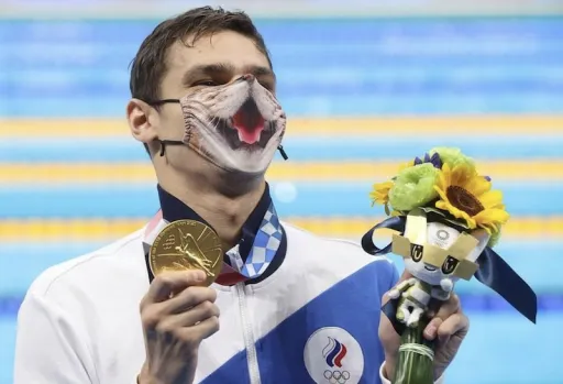 Image for article Did You See Evgeny Rylov Wear His Cat Mask in the Olympics?