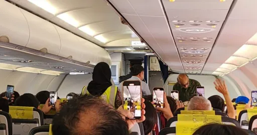 Image for article Singapore President Tharman Flies Home on Budget Scoot After Working Visit in Ipoh