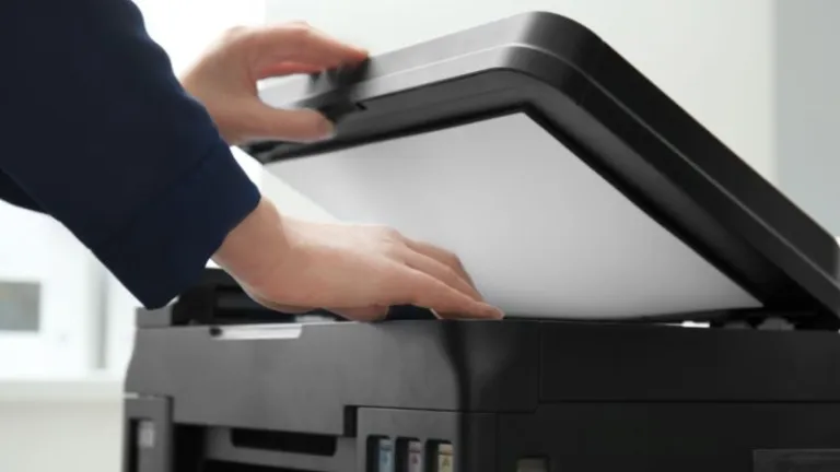 Woman Using a Photocopy Machine