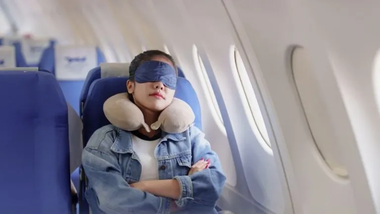 person sleeping on plane
