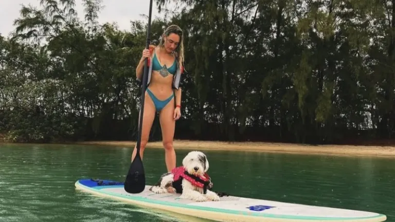 Stand-up paddleboarding with a dog