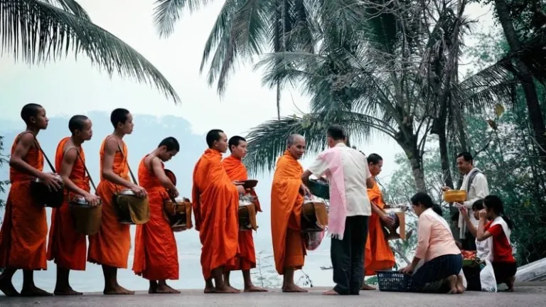 tak bat ceremony in Luang Prabang, Laos