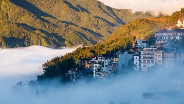 Sapa valley city covered in thick mist