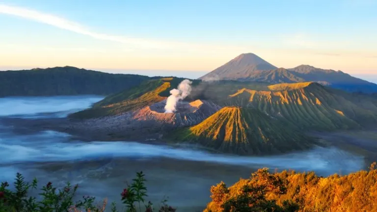 the peak of mount Bromo in the clouds