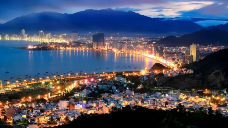night aerial view of Nha Trang city's skyline
