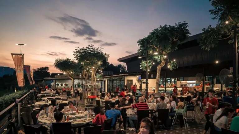 outdoor seating area of restaurant by the sea in Johor Bahru