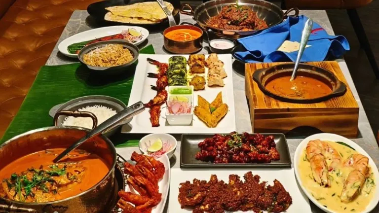 spread of Indian food at restaurant in Johor Bahru