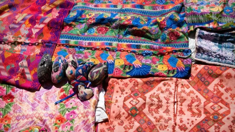 rows of Guatemalan Huipils and souvenirs