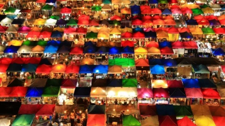 multicoloured tents in a night market