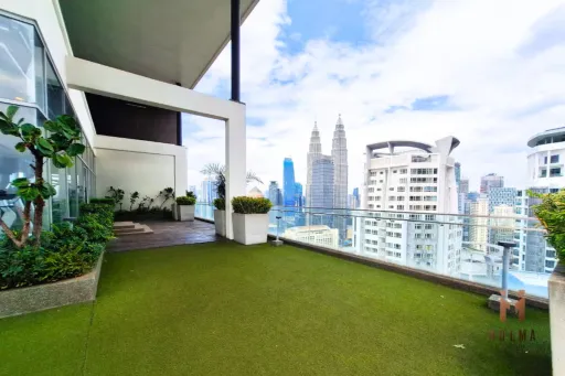 Image for article 8 Cheap yet Cosy Airbnbs in Kuala Lumpur with Twin Tower View