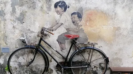 Image for article Street Artist Sues AirAsia Over Unauthorized Use of Penang Mural