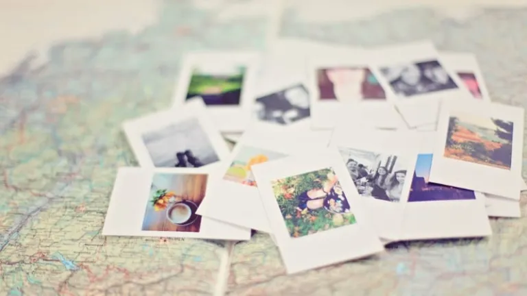 polaroids from a trip set against a map