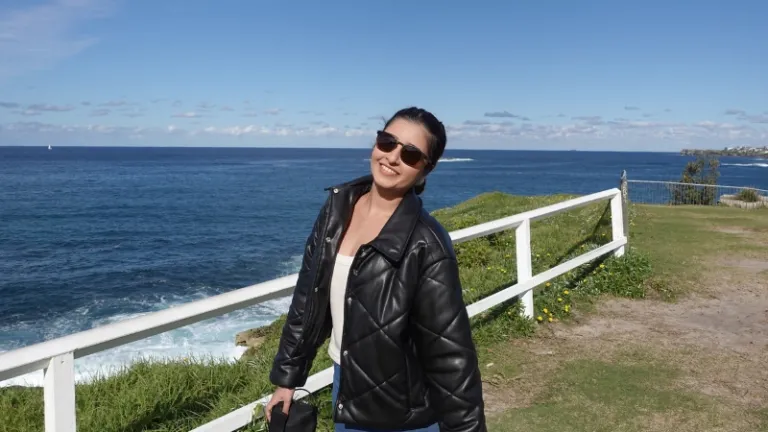smiling at one of the desginated viewing platforms at clovelly
