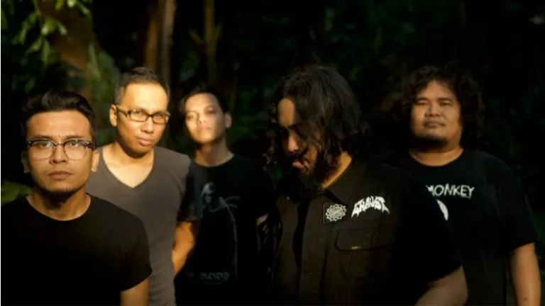 five men posing in monochrome clothes