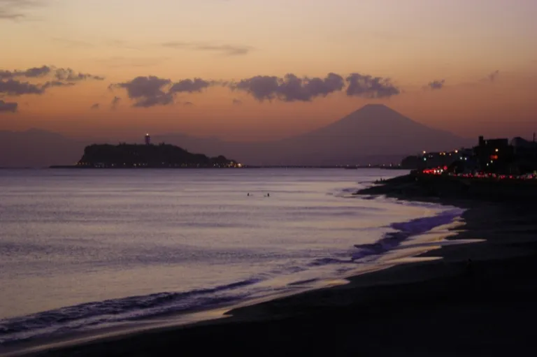 Sunset view of Kugenuma Beach with Enoshima island and Mount Fuji in the background, Kanagawa, Japan