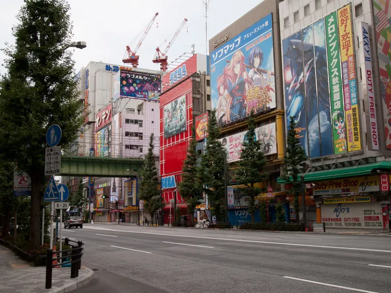 Street view of Akihabara district in Tokyo with anime billboards and electronics shops, Tokyo, Japan 