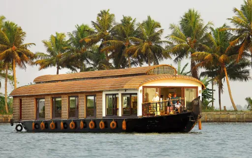 Image for article Best Houseboat Airbnb Stays in Kerala for Backwater Stays in 2026