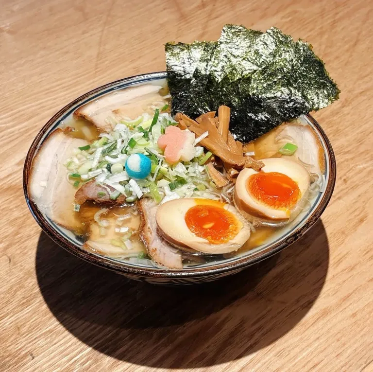 Special chuka soba topped with soft-boiled eggs, sliced pork, and nori at Ginza HARU CHAN Ramen in Tokyo.