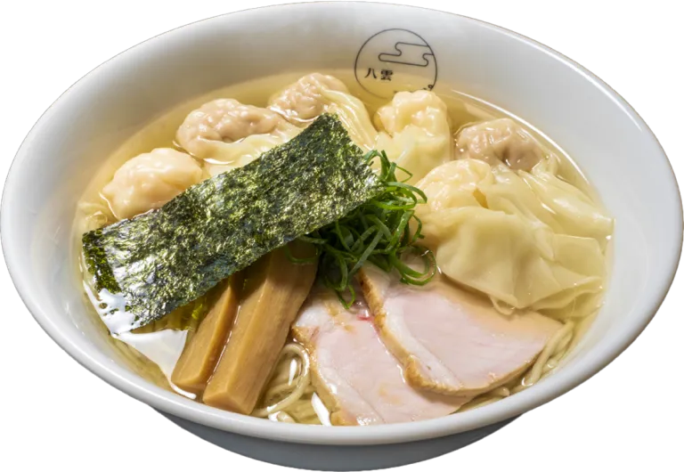 Signature wonton ramen with pork, bamboo shoots, and nori at YAKUMO in Tokyo.