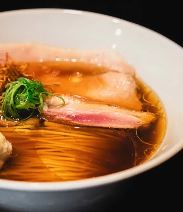 Signature shoyu ramen with sliced pork and clear soy sauce broth at Ramen Break Beats in Tokyo.