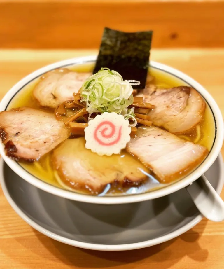 Chashu ramen topped with sliced pork, narutomaki, and nori at There Is Ramen in Ogikubo, Tokyo.
