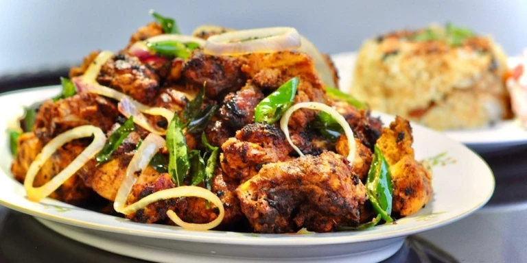Nadan Kozhi Varuthathu (Spicy Chicken Fry)