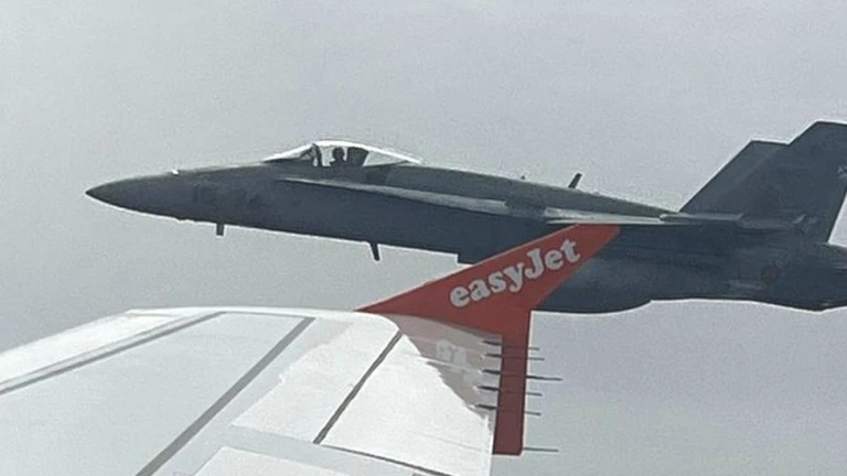 One of the two Spanish F18 fighters seen through The window of the easyJet flight from London to Menorca