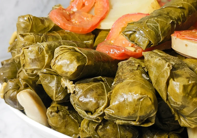 Mahshi, Grape leaves stuffed with meat and rice 